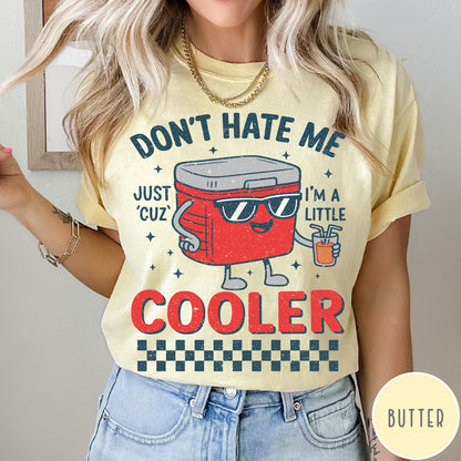 Comfort Colors tee in Butter featuring retro cooler graphic with sunglasses and a drink with text