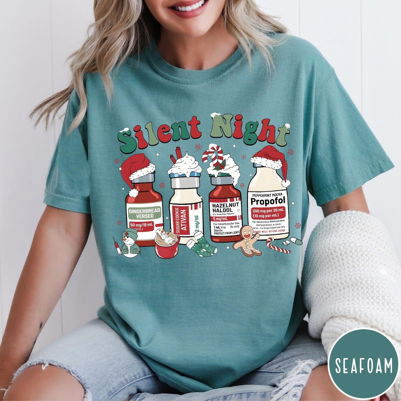 Comfort Colors tee in Seafoam featuring holiday graphic with medical vials styled as festive holiday treats