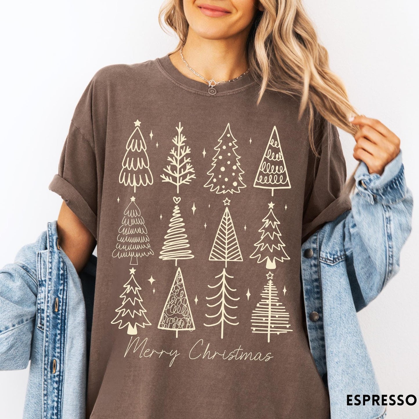 Comfort Colors tee in Espresso featuring festive graphic style with twelve unique illustrated Christmas tree designs