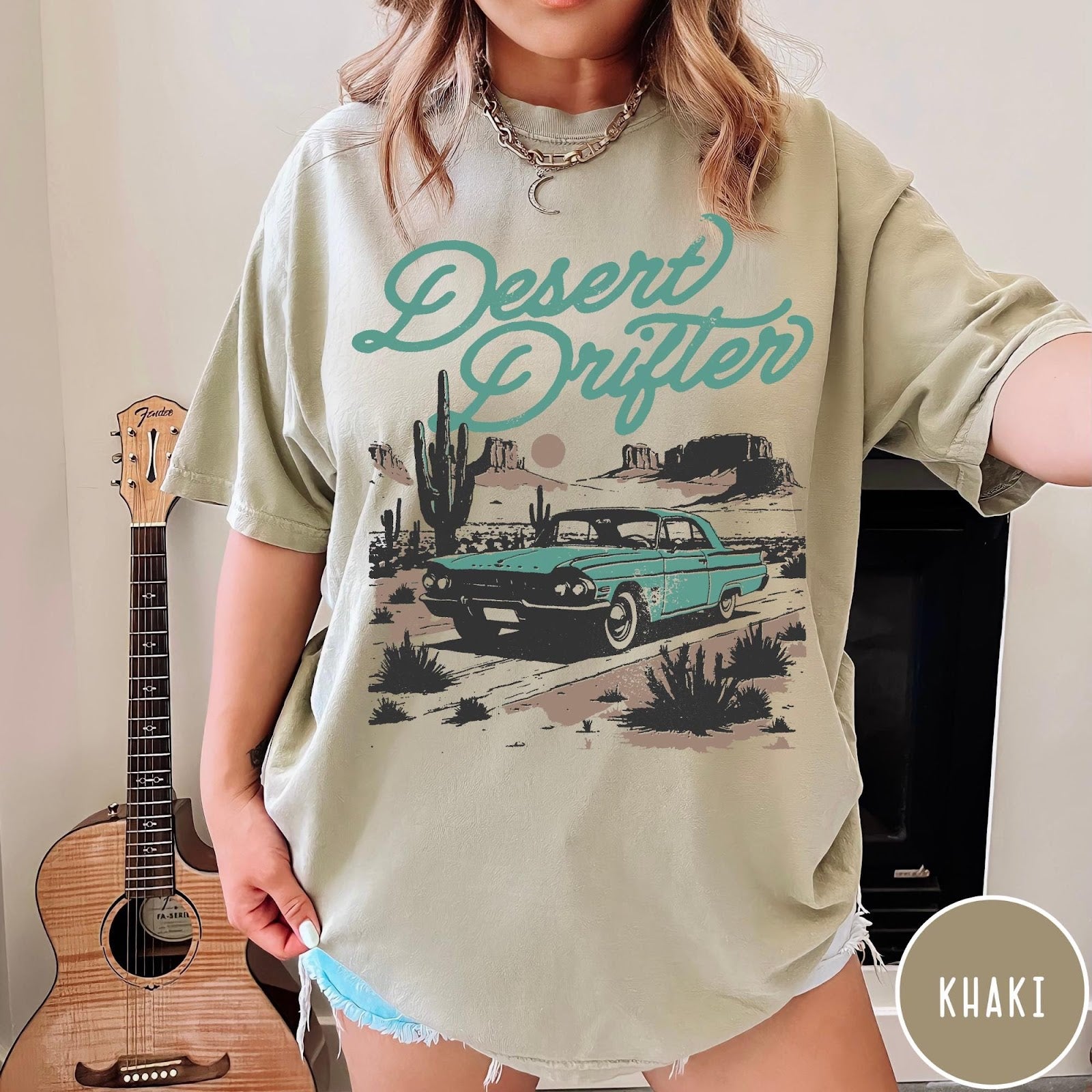 Comfort Colors tee in Khaki featuring vintage style graphic of a classic car in a desert landscape