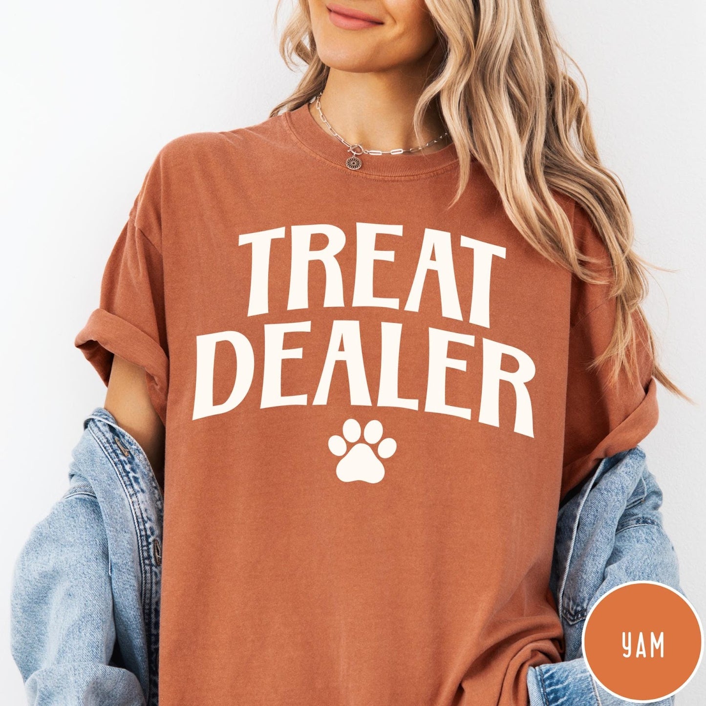 Comfort Colors tee in Yam featuring dog owner design style with Treat Dealer text and paw print