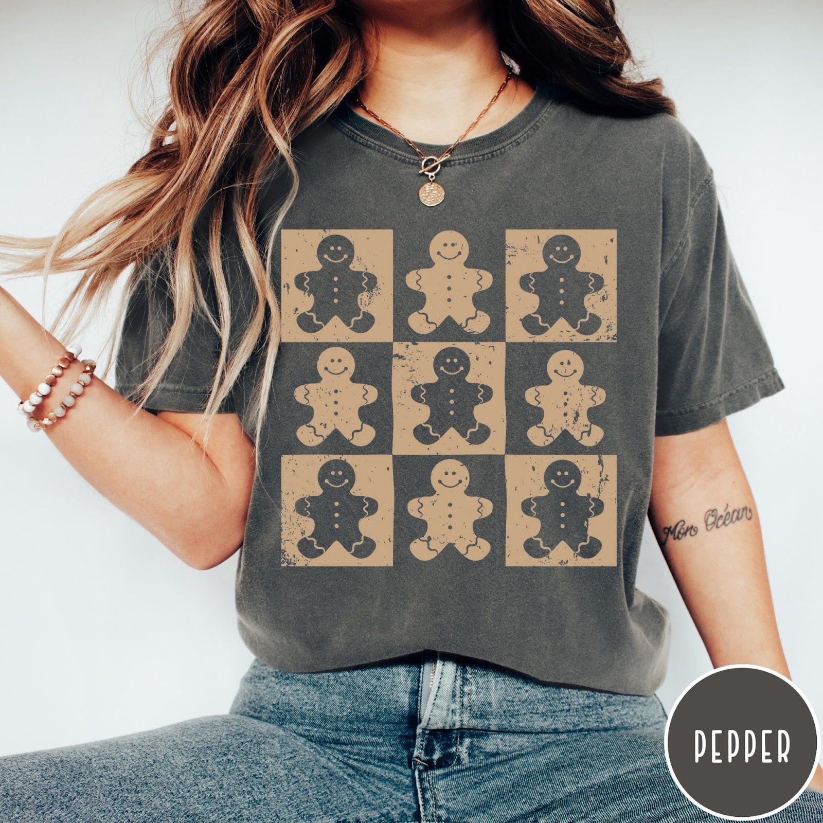 Comfort Colors tee in Pepper featuring grid design with nine alternating tan and dark gingerbread cookie icons