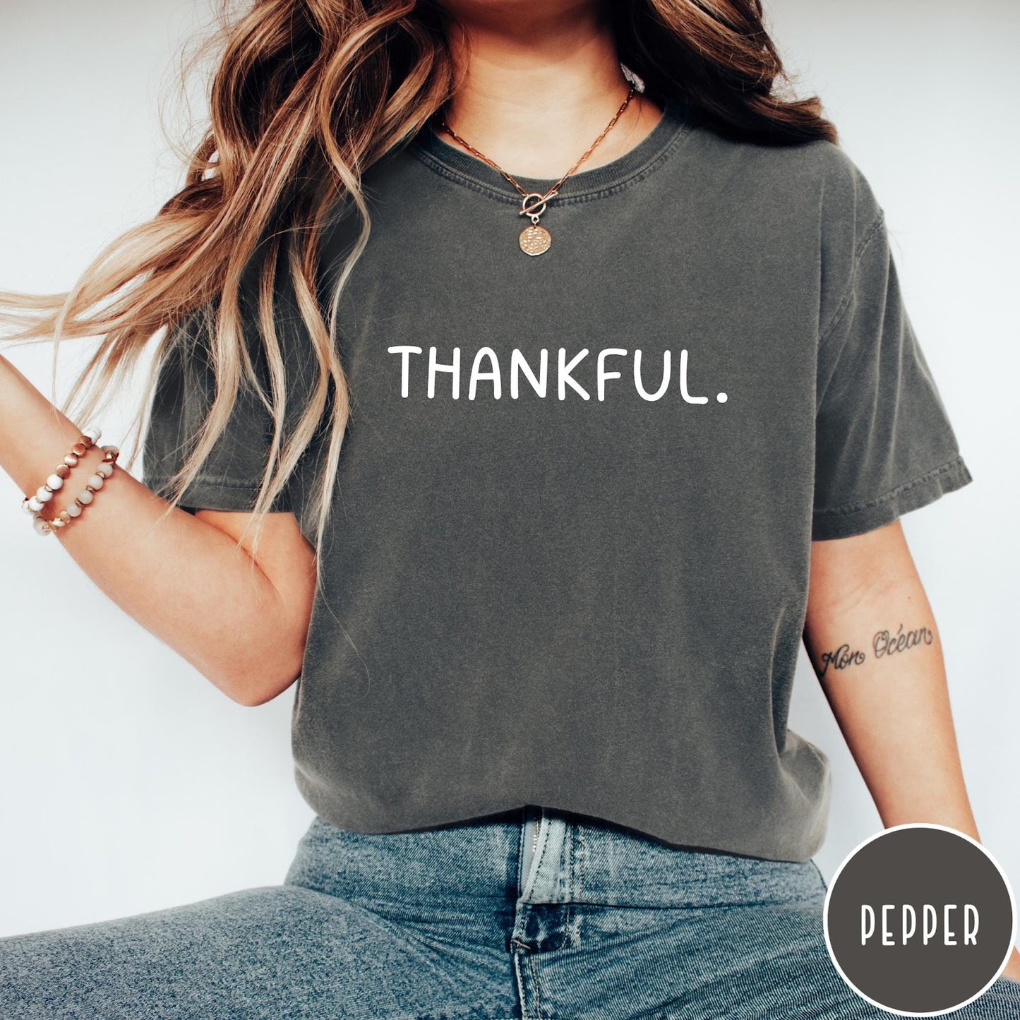 Comfort Colors tee in Pepper featuring minimalist design with the word Thankful printed in white text