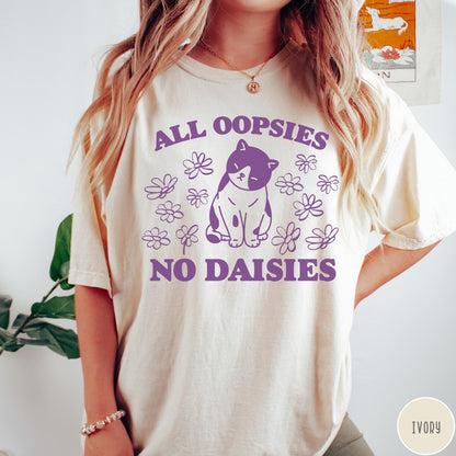 Comfort Colors tee in Ivory featuring cute cat graphic with purple text reading All Oopsies No Daisies