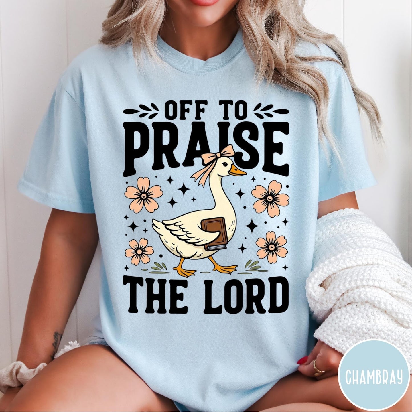 Comfort Colors tee in Chambray featuring retro style graphic of a goose wearing a bow holding a book