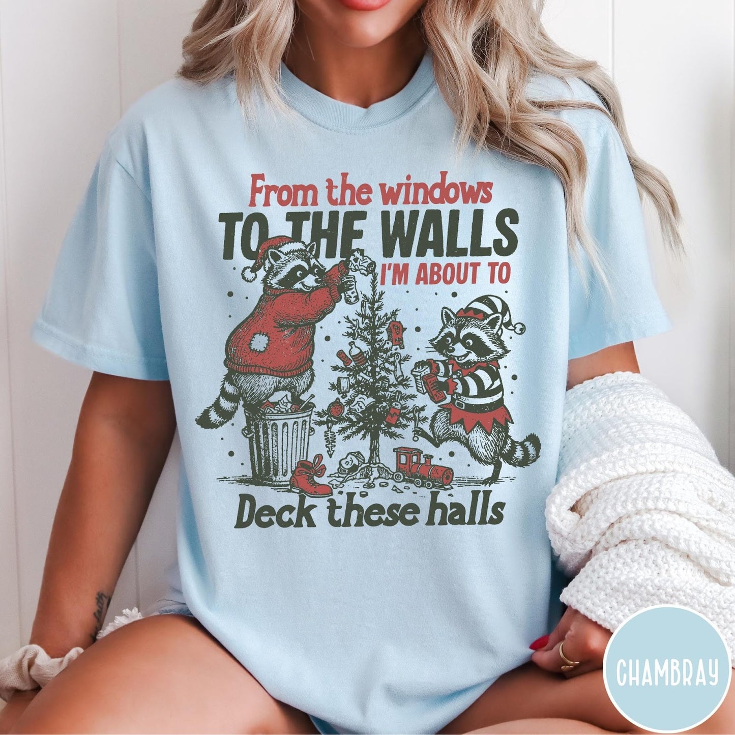 Comfort Colors tee in Chambray featuring vintage style graphic of two raccoons decorating a Christmas tree with trash