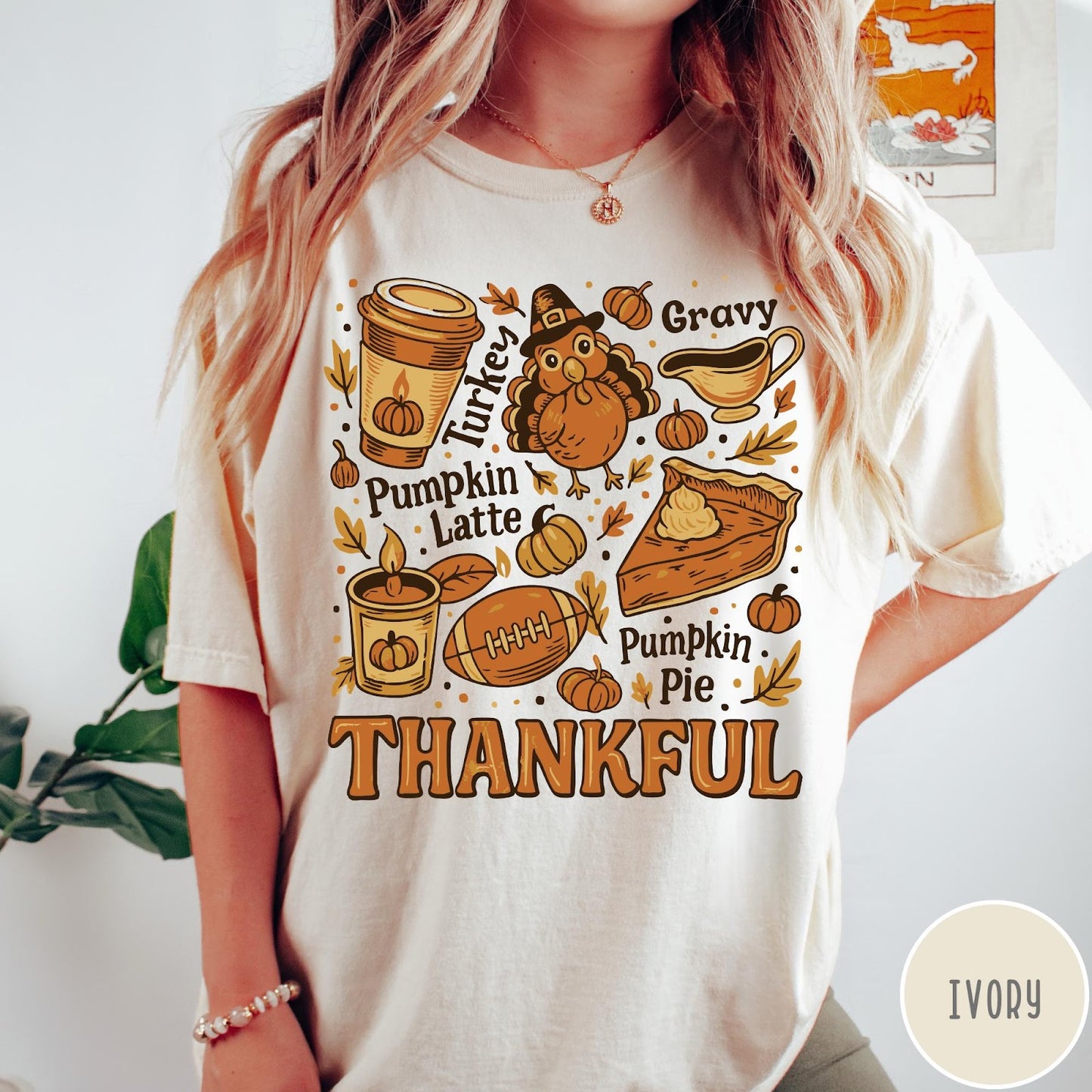 Comfort Colors tee in Ivory featuring retro Thanksgiving dinner items including turkey, pumpkin latte, and pumpkin pie graphic