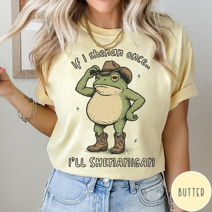 Comfort Colors tee in Butter featuring western graphic of a frog wearing a cowboy hat and boots