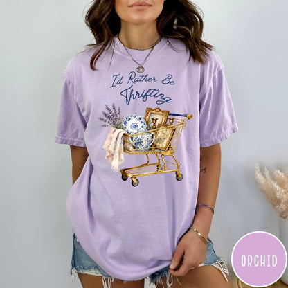 Comfort Colors tee in Orchid featuring vintage style graphic of a shopping cart filled with antique decor items