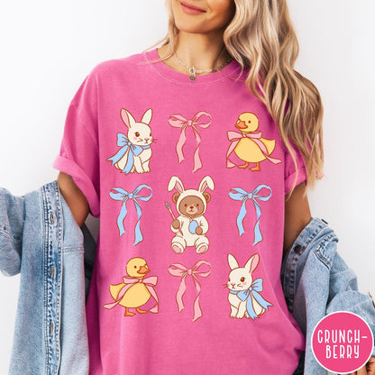 Comfort Colors tee in Crunchberry featuring vintage graphic style with Easter bunnies, ducks, and pink blue bows