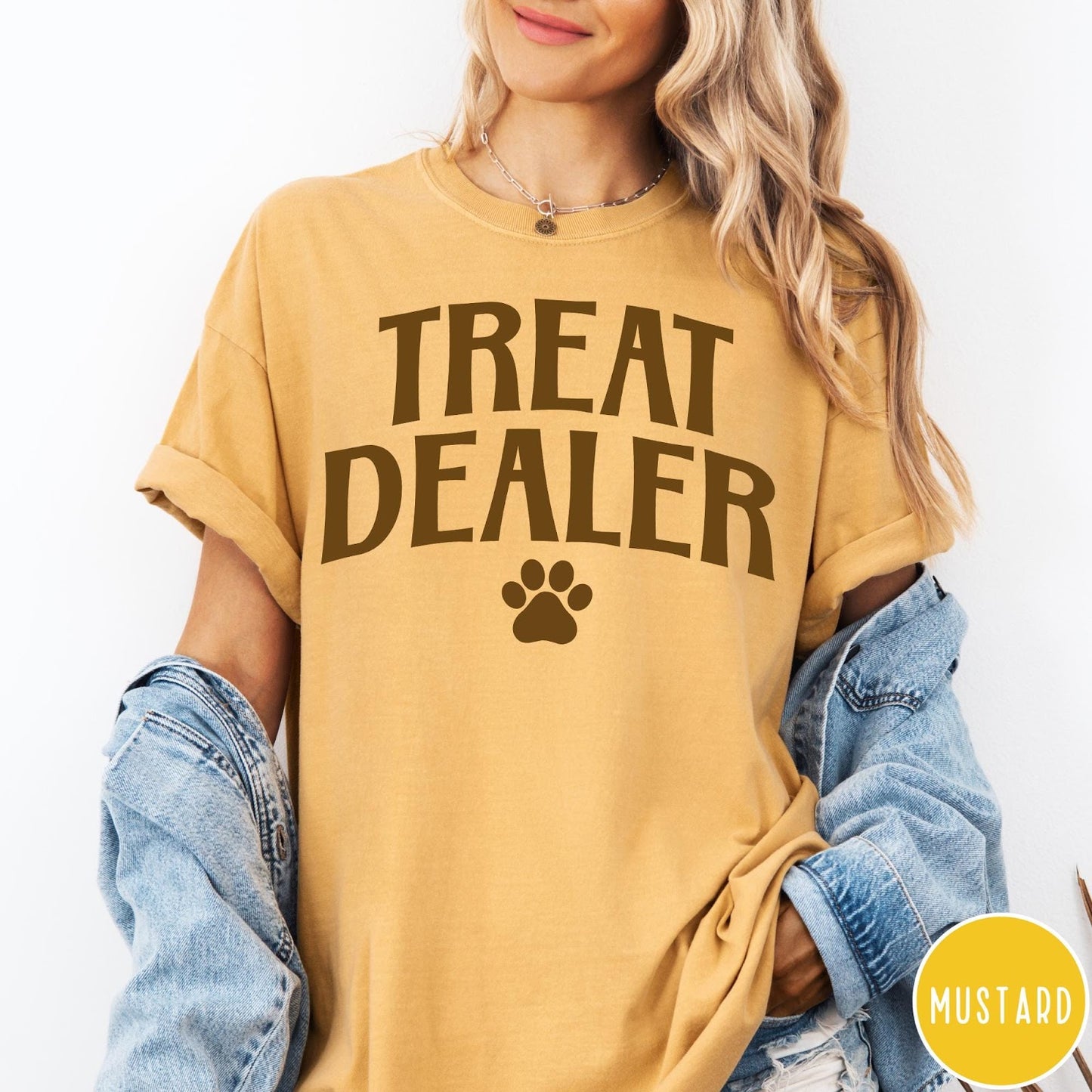 Comfort Colors tee in Mustard featuring dog owner design style with Treat Dealer text and paw print