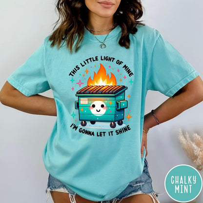 Comfort Colors tee in Chalky Mint featuring cartoon style graphic of a smiling dumpster fire with text