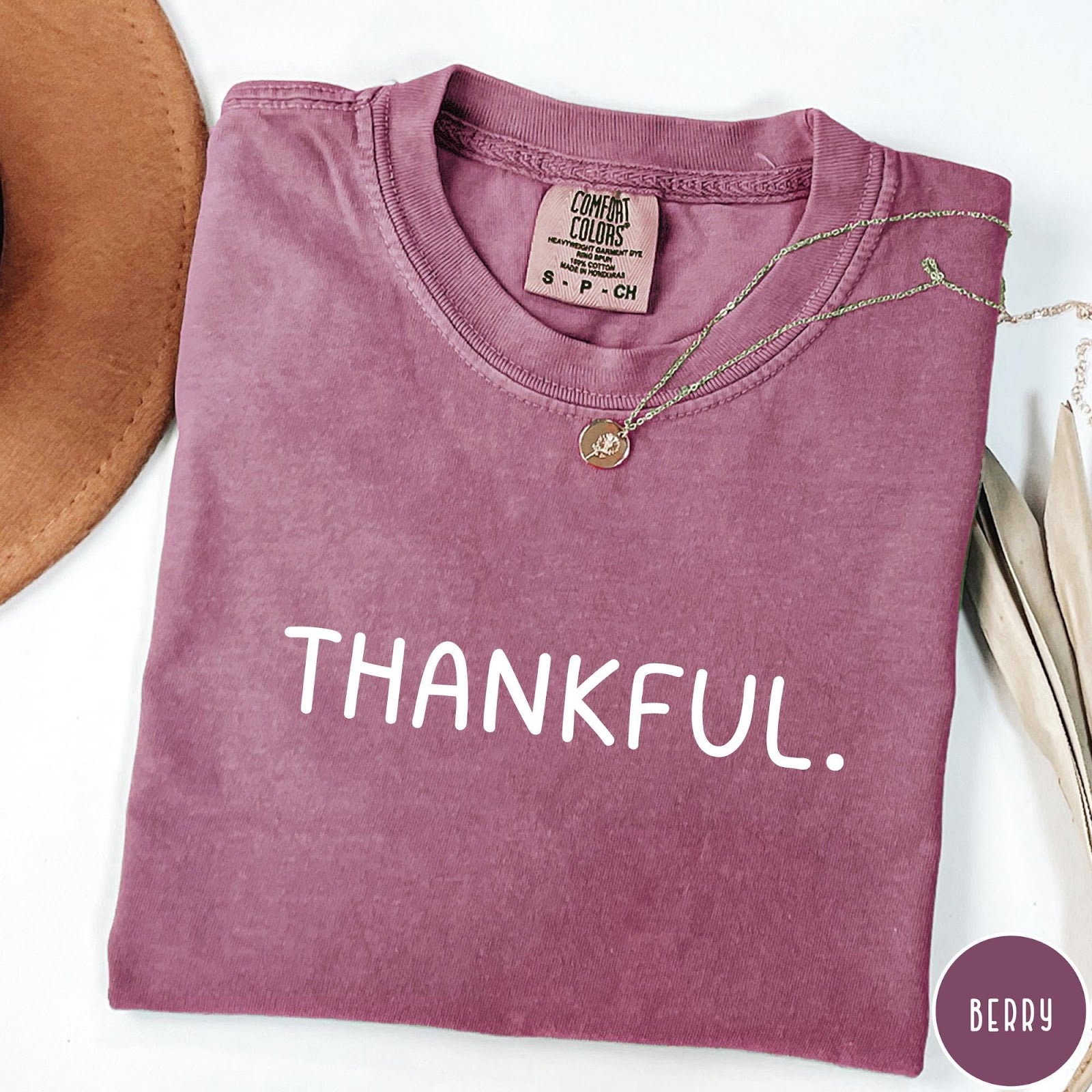 Comfort Colors tee in Berry featuring minimalist style with the word Thankful printed in white text