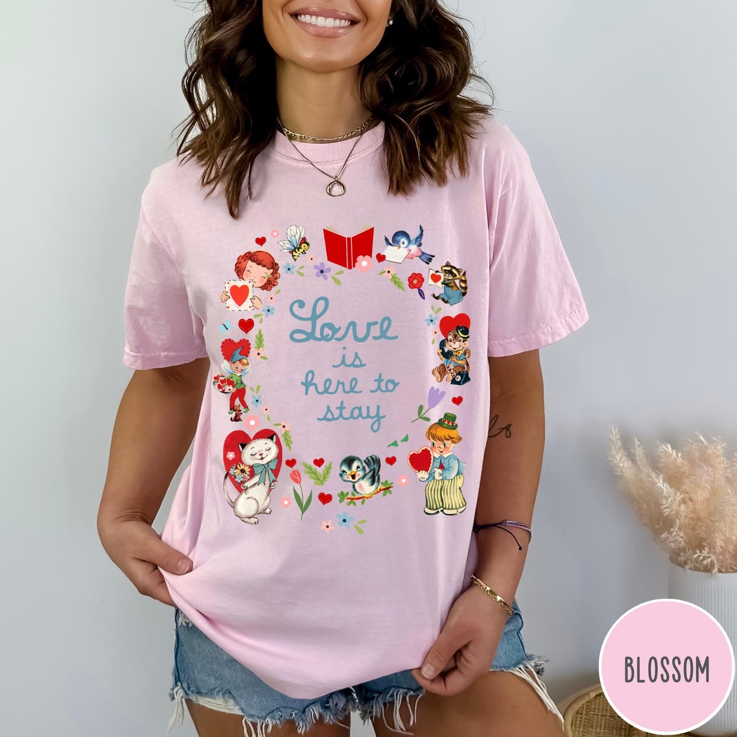 Comfort Colors tee in Blossom featuring vintage Valentine's collage with cute animals, flowers, and romantic text.