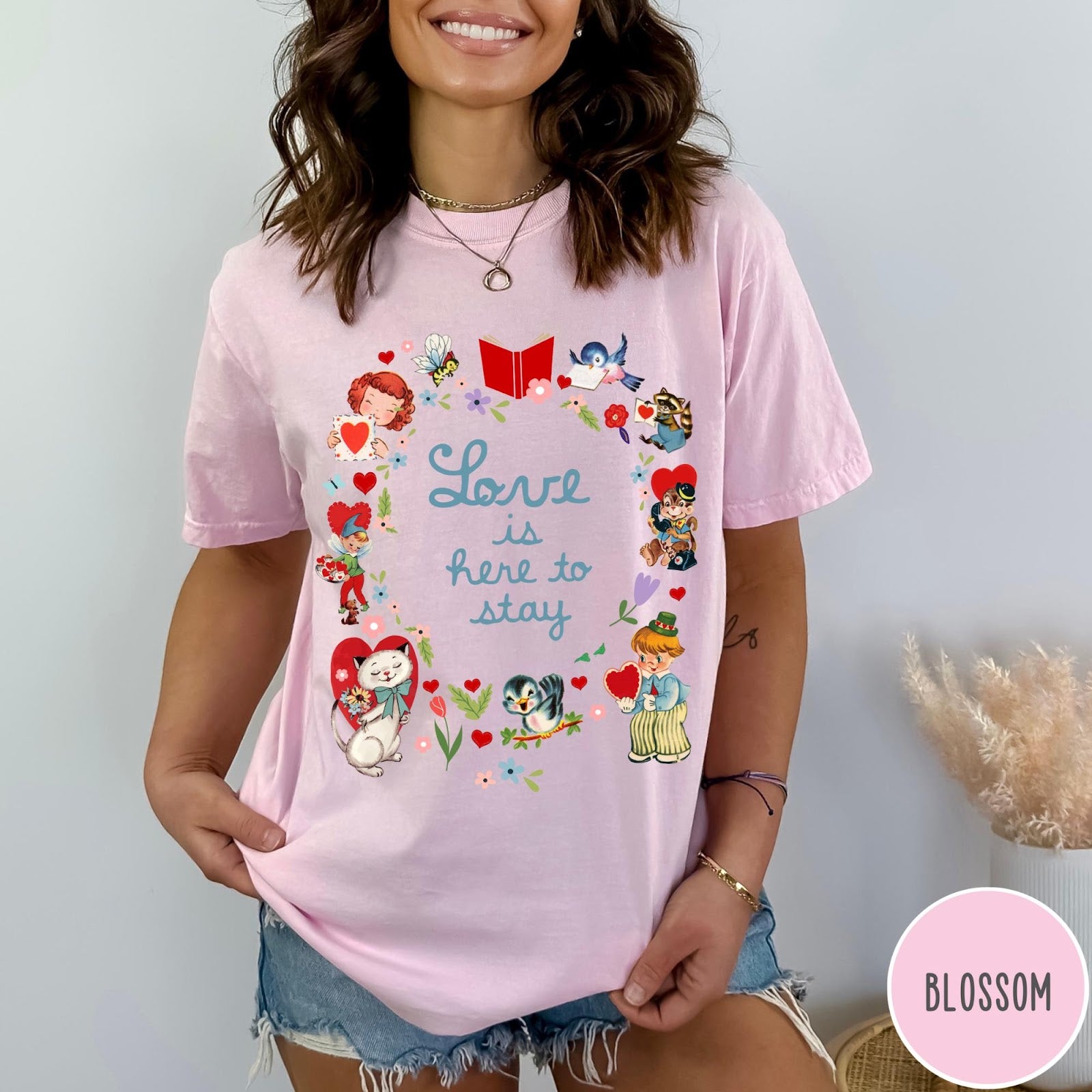 Comfort Colors tee in Blossom featuring vintage Valentine's collage with cute animals, flowers, and romantic text.