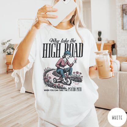 Comfort Colors tee in White featuring vintage style graphic of a woman on a tricycle with wine