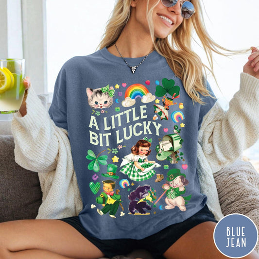 Comfort Colors tee in Blue Jean featuring St. Patrick's Day collage with vintage characters and lucky symbols
