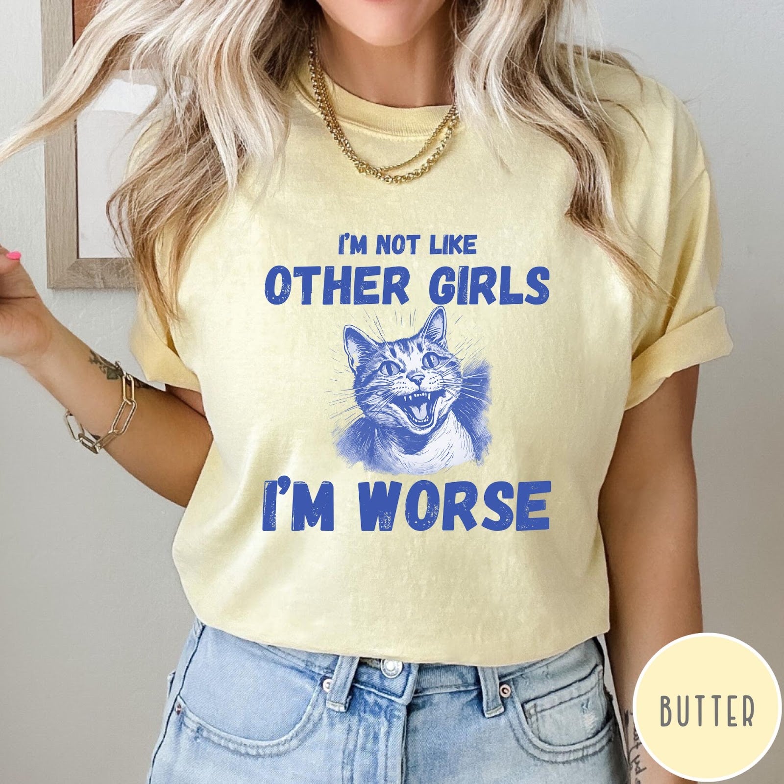 Comfort Colors tee in Butter featuring screen printed graphic of a hissing cat and humorous text