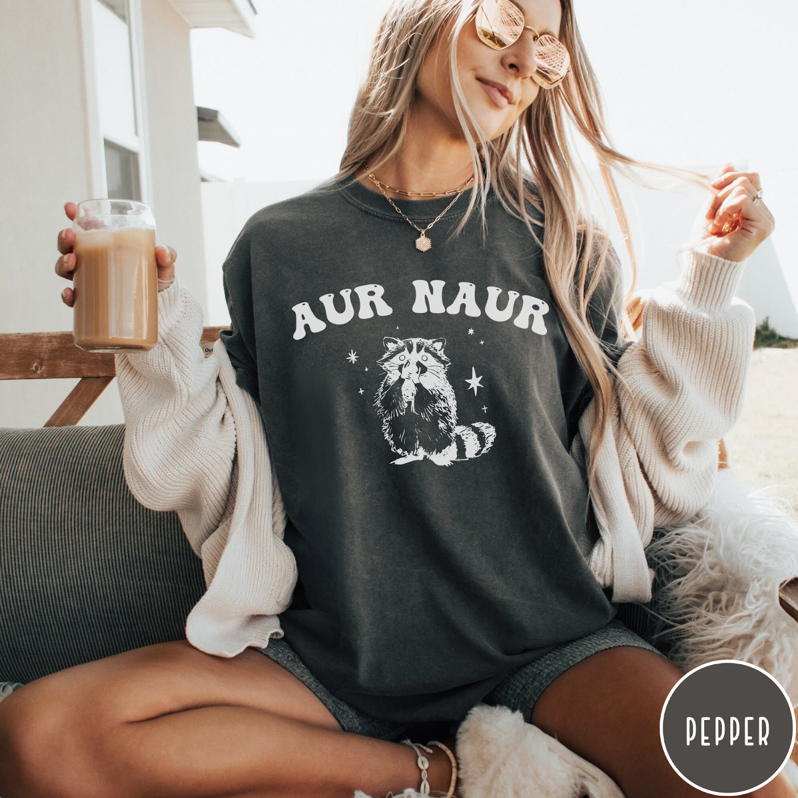 Comfort Colors tee in Pepper featuring retro style graphic of a raccoon with stars and text