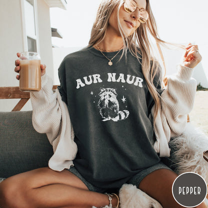 Comfort Colors tee in Pepper featuring retro style graphic of a raccoon with stars and text