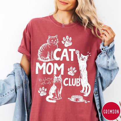 Comfort Colors tee in Crimson featuring vintage style graphic with cats, paw prints, and Cat Mom Club text