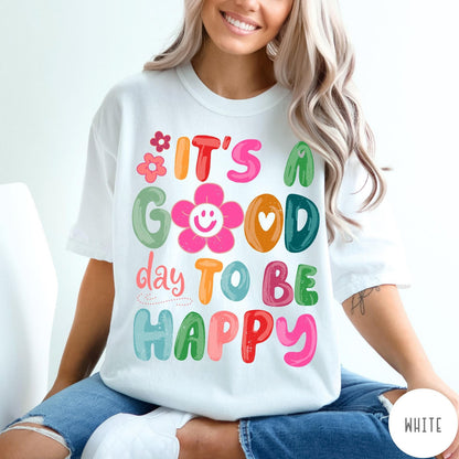 Comfort Colors tee in White featuring typography and floral elements with a smiley face graphic design