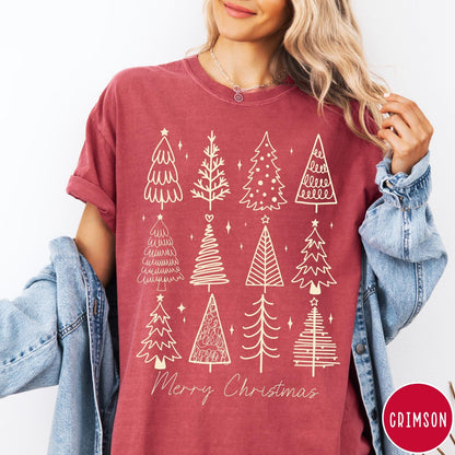 Comfort Colors tee in Crimson featuring festive graphic style with twelve unique illustrated Christmas tree designs