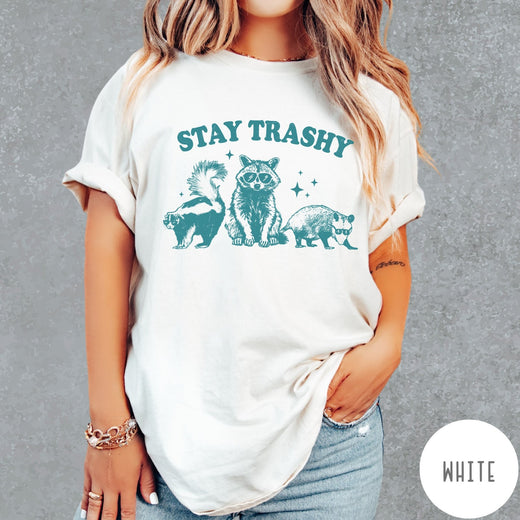 Comfort Colors tee in White featuring graphic style raccoon, skunk, and opossum wearing sunglasses with Stay Trashy text