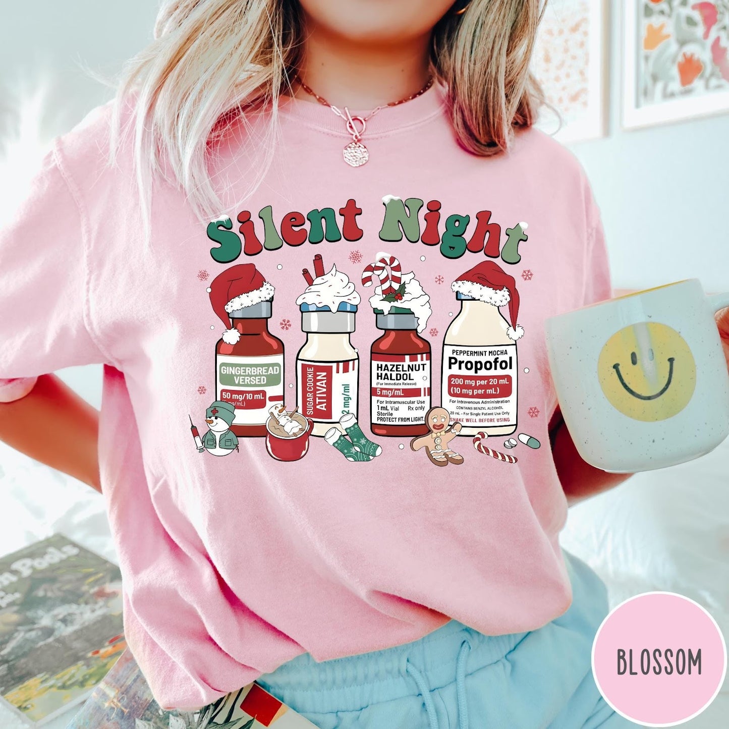 Comfort Colors tee in Blossom featuring holiday graphic with medical vials styled as festive holiday treats