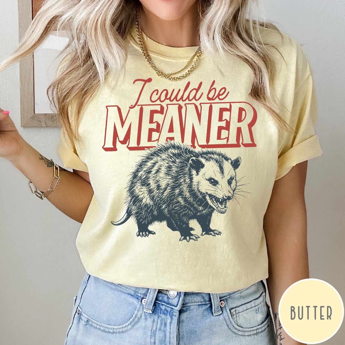 Comfort Colors tee in Butter featuring screen printed opossum graphic with text I could be meaner