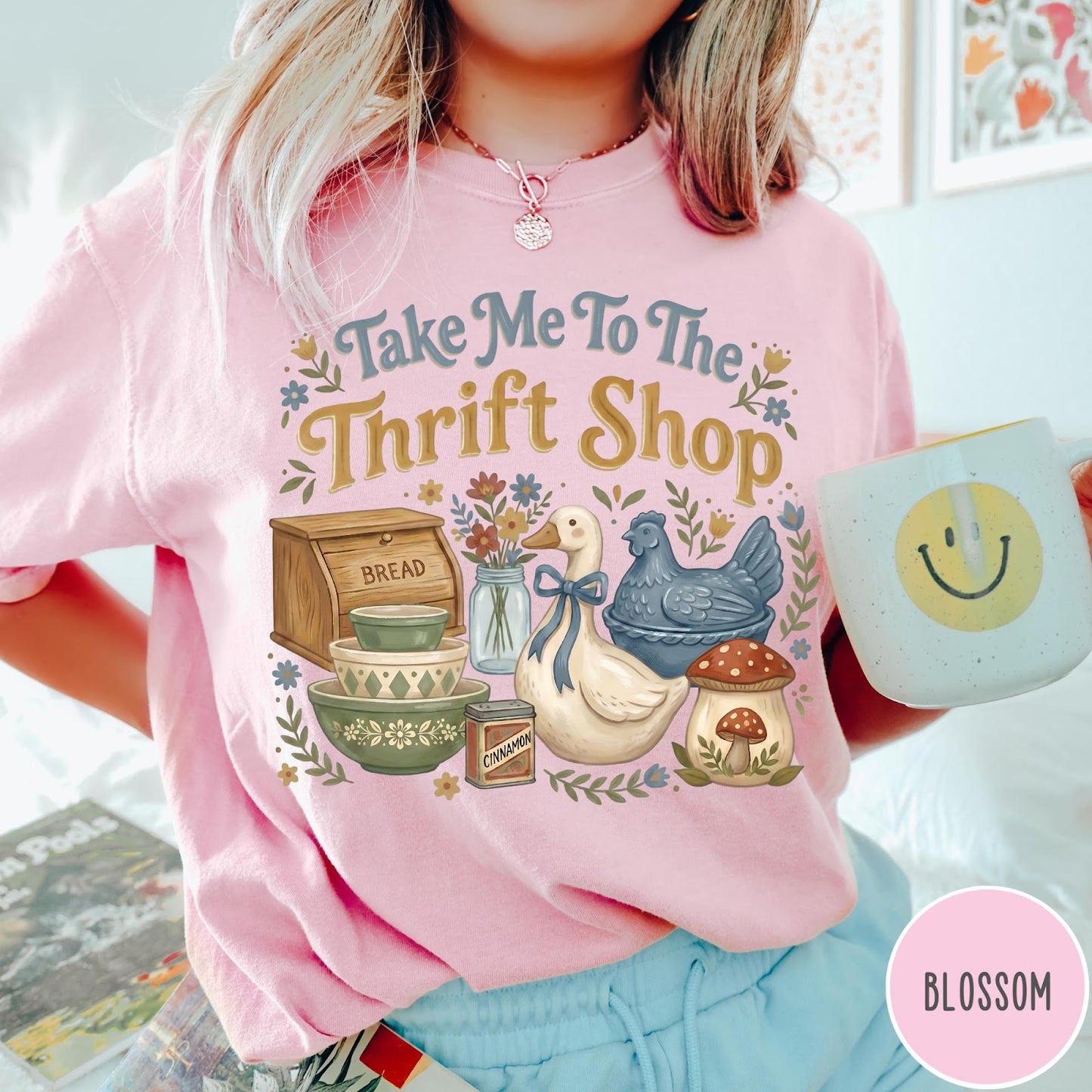 Comfort Colors tee in Blossom featuring vintage kitchenware graphic with bread box, bowls, goose, and mushroom.