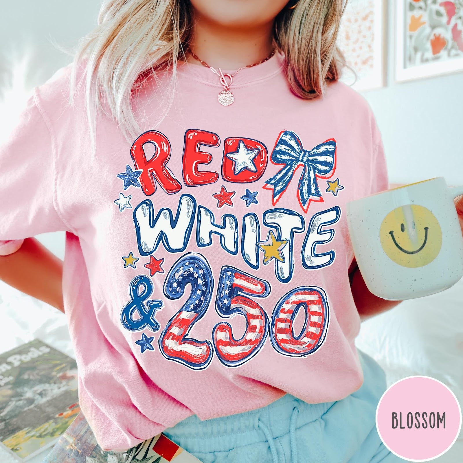 Comfort Colors tee in Blossom featuring patriotic 250th anniversary graphic with red white and blue stars