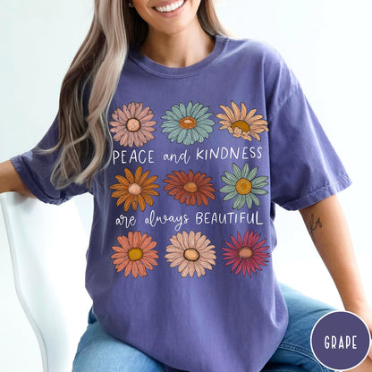 Comfort Colors tee in Grape featuring floral design with Peace and Kindness are always beautiful text graphic