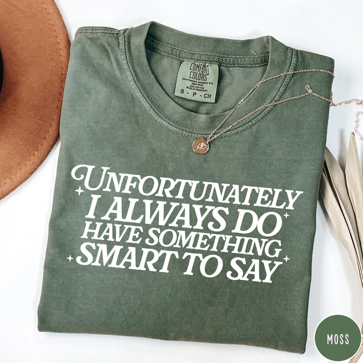 Comfort Colors tee in Moss featuring typography graphic with the text Unfortunately I Always Do Have Something Smart To Say