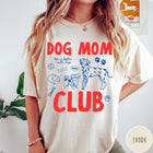 Comfort Colors tee in Ivory featuring playful dog-themed graphic with Dalmatian and text Dog Mom Club