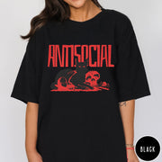 Comfort Colors tee in Black featuring retro graphic design of a black cat with skull and tombstone