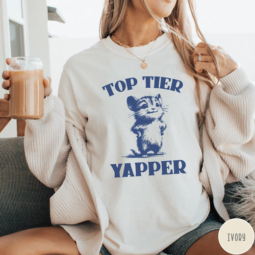 Comfort Colors tee in Ivory featuring graphic design of a chattering animal with Top Tier Yapper text