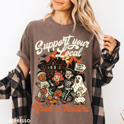 Comfort Colors tee in Espresso featuring vintage style trick or treaters graphic with a haunted house background