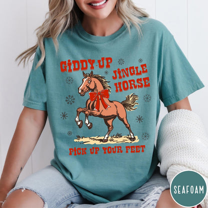 Comfort Colors tee in Seafoam featuring festive holiday graphic with a prancing horse wearing a red bow
