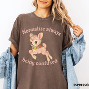 Comfort Colors tee in Espresso featuring vintage style fawn graphic with flowers and Normalize Always Being Confused text
