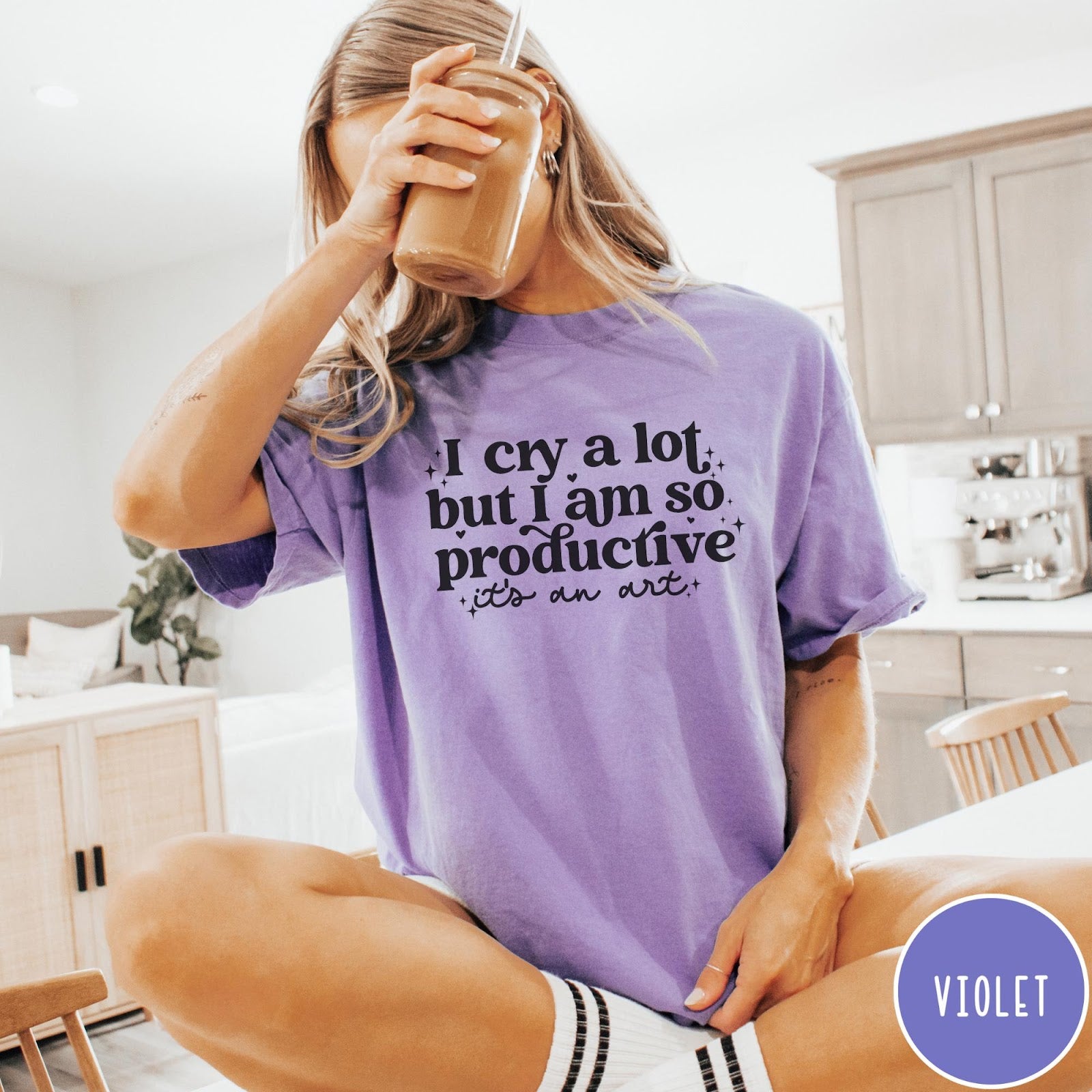 Comfort Colors tee in Violet featuring mental health humor graphic text I Cry but Productive