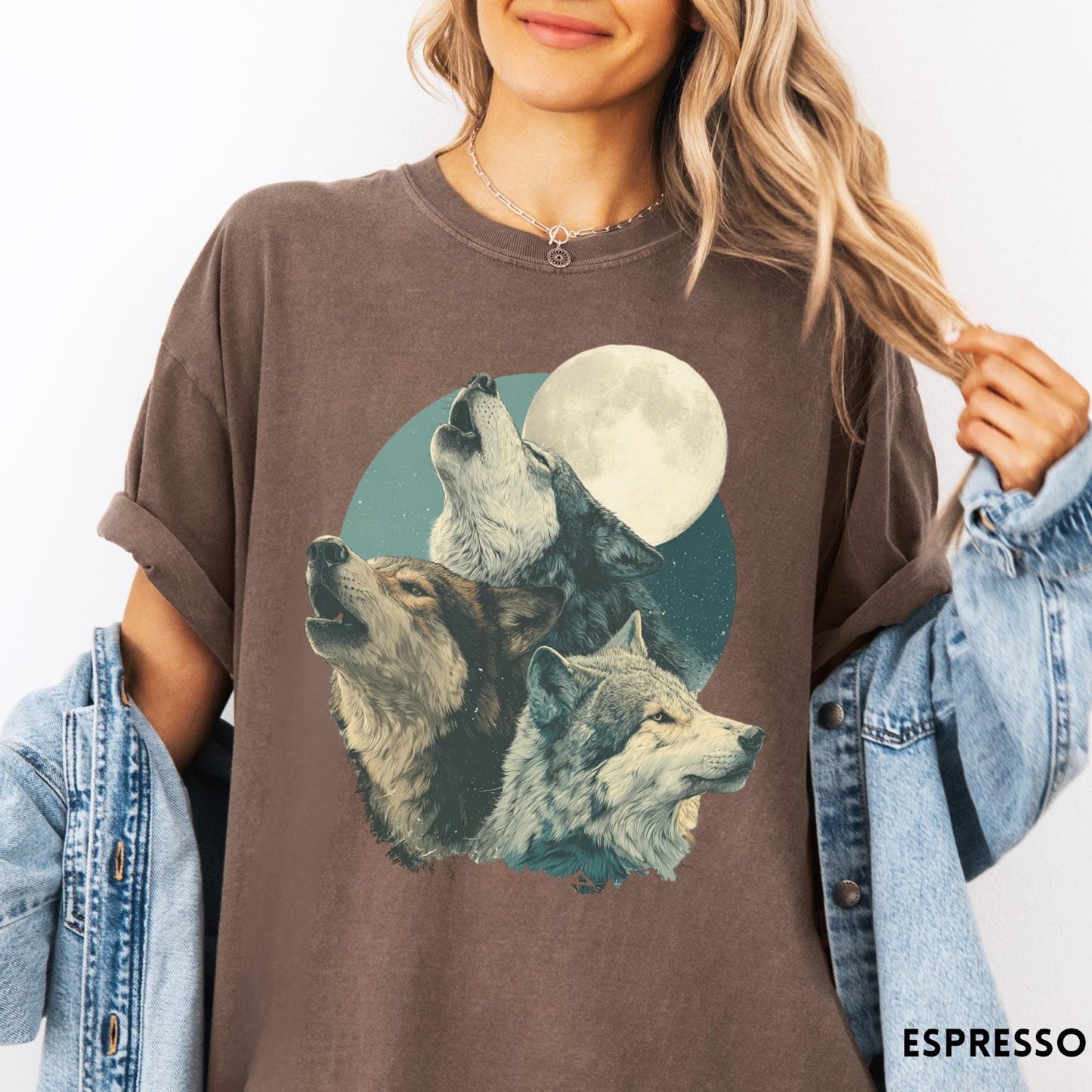 Comfort Colors tee in Espresso featuring vintage style graphic of three howling wolves under a full moon