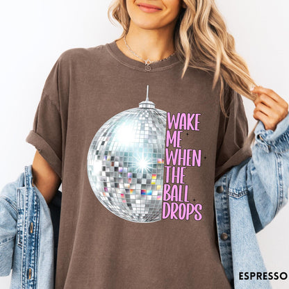 Comfort Colors tee in Espresso featuring disco ball graphic with text Wake Me When The Ball Drops