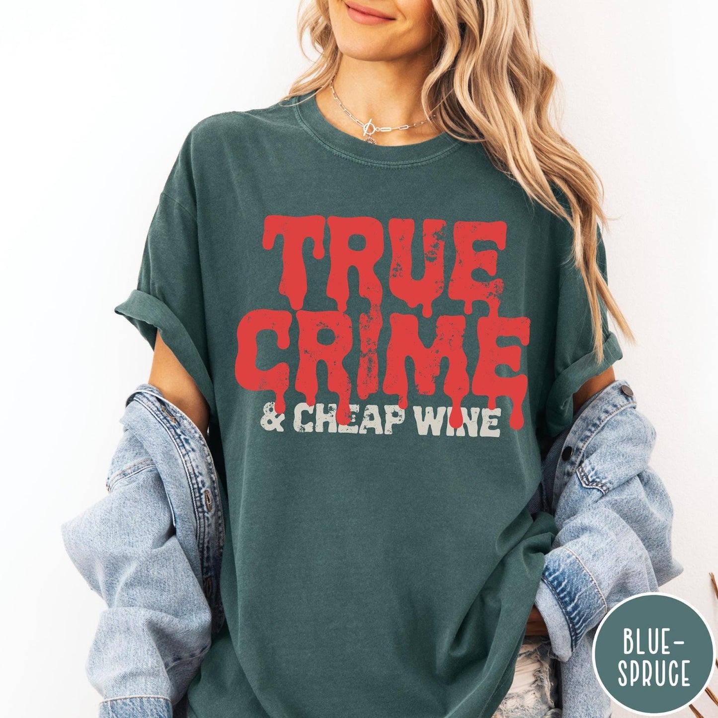 Comfort Colors tee in Blue Spruce featuring red dripping text graphic that says True Crime and Cheap Wine