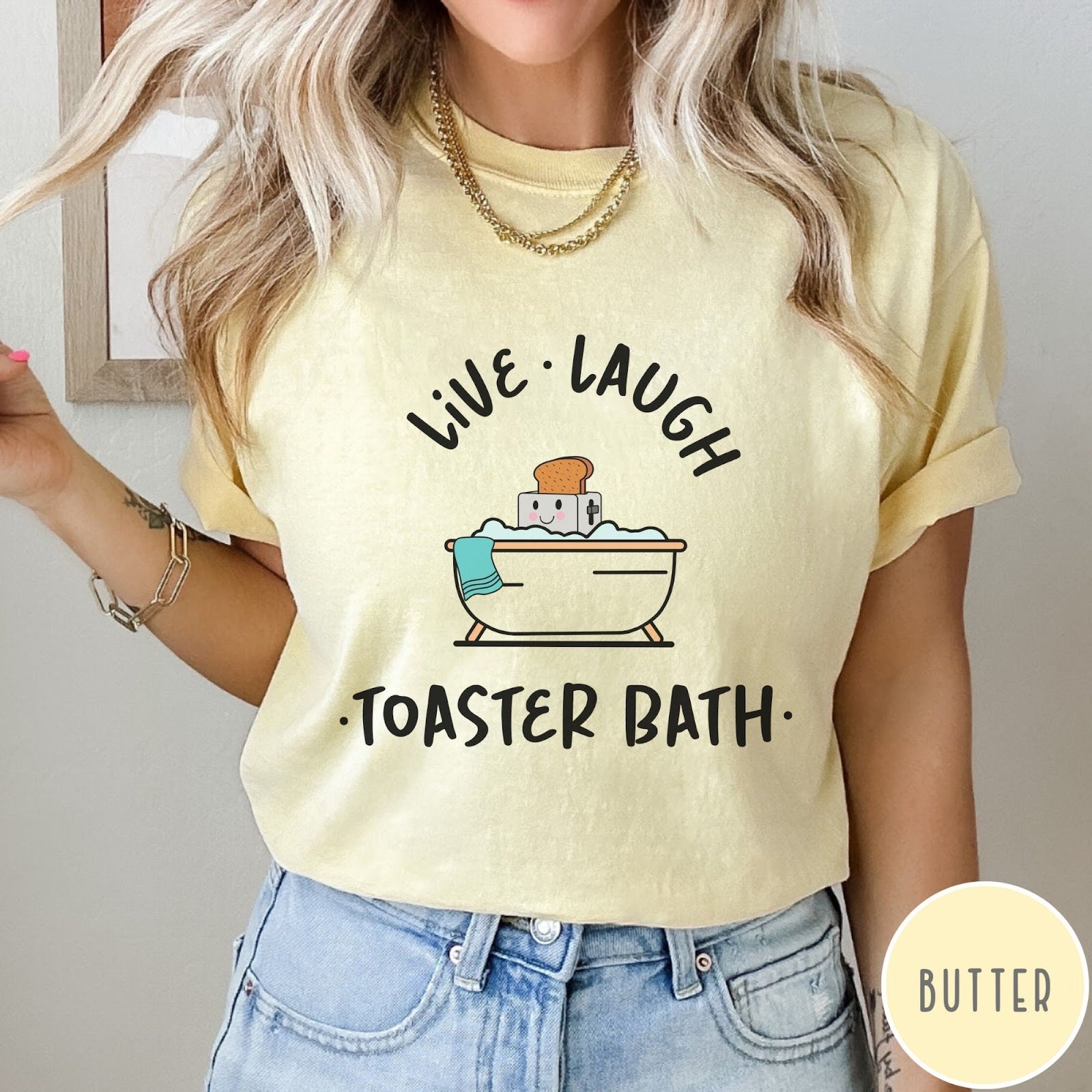 Comfort Colors tee in Butter featuring cute graphic style of a smiling toaster sitting in a bathtub