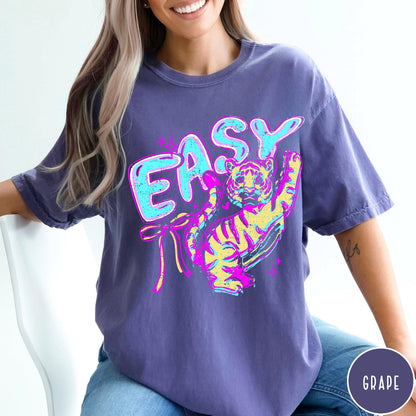 Comfort Colors tee in Grape featuring retro graphic style with a tiger and the word Easy
