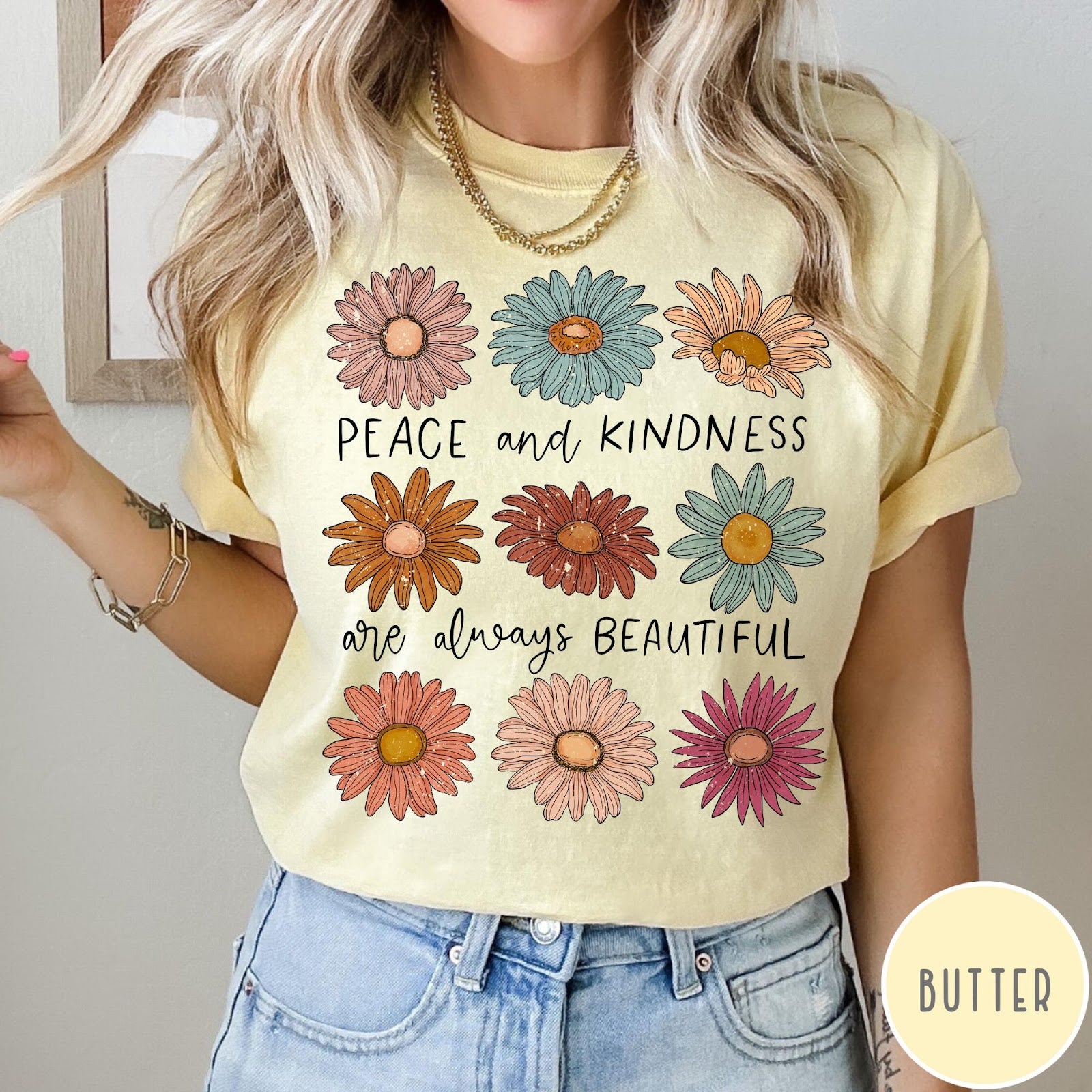 Comfort Colors tee in Butter featuring floral design with Peace and Kindness are always beautiful text graphic
