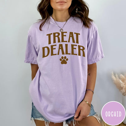 Comfort Colors tee in Orchid featuring dog owner design style with Treat Dealer text and paw print