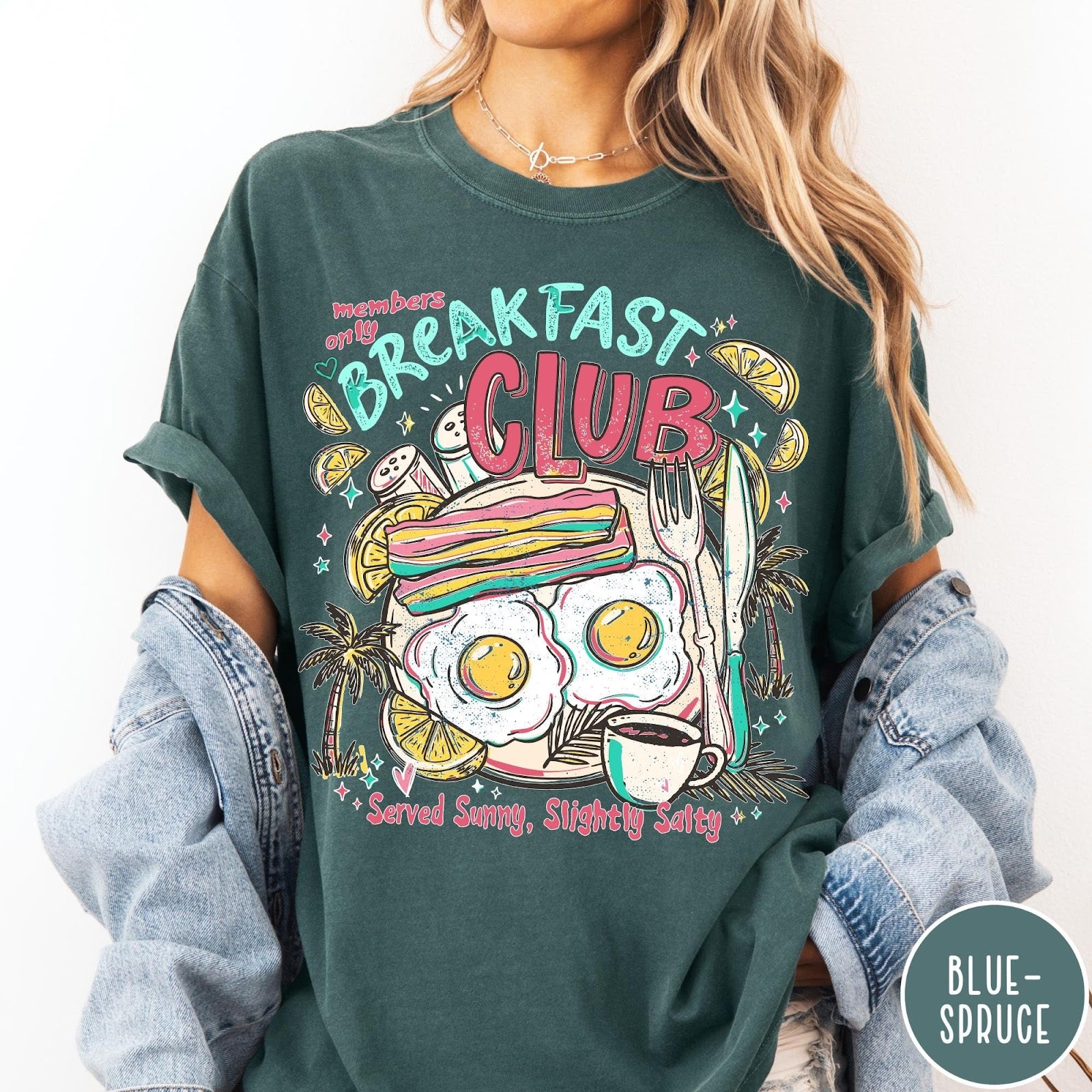 Comfort Colors tee in Blue Spruce featuring retro breakfast food graphic with eggs, bacon, and coffee illustration