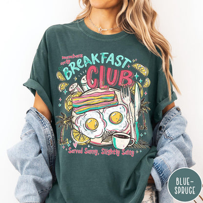 Comfort Colors tee in Blue Spruce featuring retro breakfast food graphic with eggs, bacon, and coffee illustration